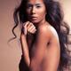 Sensual portrait of a beautiful young woman with long wavy hair... (thumbnail)