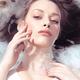 Beauty portrait of a woman lying in water... (thumbnail)