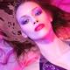 Beauty face portrait of woman lying in water with makeup in vivid pink... (thumbnail)