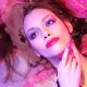 Beauty face portrait of woman lying in water with colorful makeup... (thumbnail)