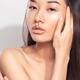 Young asian woman face closeup... (thumbnail)