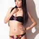 Young asian woman wearing a bikini swimsuit... (thumbnail)