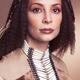 Beauty portrait of a woman wearing aboriginal accessories... (thumbnail)