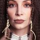 Portrait of a beautiful woman wearing aboriginal accessories... (thumbnail)