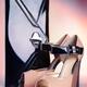 Fancy high heel shoes and a hand bag still life... (thumbnail)