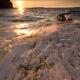 Sunset nature scenery of waves hitting rocky shore... (thumbnail)