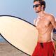 Young man going surfing... (thumbnail)