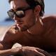 Closeup portrait of a man in sunglasses at the beach... (thumbnail)