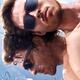 Man in sunglasses lying in the sun on a mirror... (thumbnail)