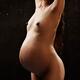 Pregnant Woman Standing in the Rain... (thumbnail)