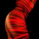 Artistic nude woman body painted with red laser... (thumbnail)