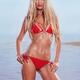 Sexy young woman in red bikini at the beach... (thumbnail)