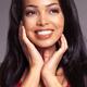 Portrait of a smiling black young woman... (thumbnail)