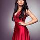 Young black woman wearing red dress... (thumbnail)