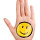 Hand with a happy smiley icon... (thumbnail)