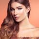 Beauty face portrait of a young woman with natural look on long wavy s... (thumbnail)