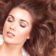 Beautiful woman with long hair lying with closed eyes... (thumbnail)
