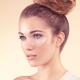 Beautiful young woman with natural look and updo... (thumbnail)