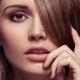 Closeup of young woman face with bangs covering her eye... (thumbnail)