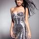 Smiling young woman wearing fancy shiny dress... (thumbnail)