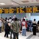 People Waiting at Airport Arrivals Hall... (thumbnail)