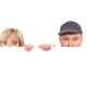 Humorous couple faces behind white sign... (thumbnail)
