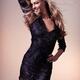 Beautiful smiling woman wearing short black dress... (thumbnail)