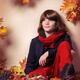 Boy sitting on autumn leaves fall fashion style