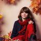 Boy in fall clothes sitting on red autumn leaves... (thumbnail)