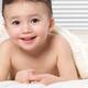 Portrait of a cute little boy under a blanket... (thumbnail)