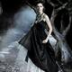 Beautiful woman in long dress in a mysterious forest... (thumbnail)