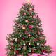 Decorated Christmas tree with presents on pink... (thumbnail)