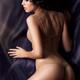 Young sensual woman in lingerie on flowy fabric background... (thumbnail)