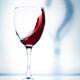 Glass of red wine in question artistic concept... (thumbnail)