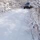 Car on snow covered country road... (thumbnail)