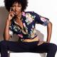 Fashion photo of young black woman in dark floral shirt... (thumbnail)