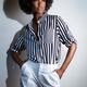 African american woman in black and white stylish clothes... (thumbnail)