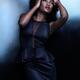 High fashion photo of beautiful black african american woman in black... (thumbnail)
