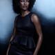 Beautiful african american woman in shiny black dress... (thumbnail)