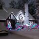 Covered with snow house with Christmas lights... (thumbnail)