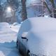 Cars on city street covered with snow in winter... (thumbnail)