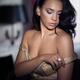 Sensual portrait of young woman undressing in bedroom... (thumbnail)