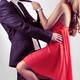 Young couple flirty woman in dress and man in suit... (thumbnail)