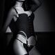 Sexy woman wearing lingerie and stockings Black and white... (thumbnail)