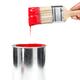 Person with paintbrush dipped in red paint... (thumbnail)