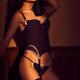Sexy woman wearing lingerie and stockings... (thumbnail)