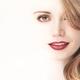 Beautiful young woman face blending into light background... (thumbnail)