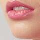 Closeup of young woman lips... (thumbnail)