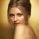 Sensual beauty portrait of woman in golden colors... (thumbnail)