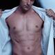 Expressive portrait of a man taking of his shirt... (thumbnail)